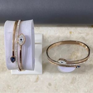 Charm NWT Bangle Bracelet with Snake and Evil Eye